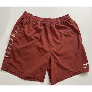 Gymshark Arrival 7” Shorts Men’s Size M  Rust Red